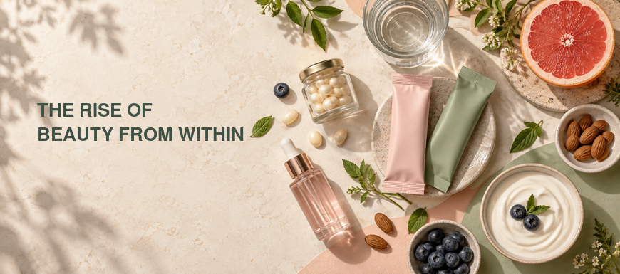 Inner beauty supplements with yogurt, berries, grapefruit and almonds in a wellness flat lay